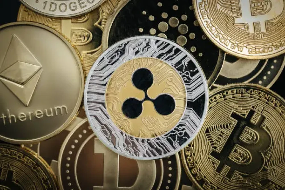 Analyst Predicts 2026 XRP at $23, Dogecoin $2, Solana $1,800