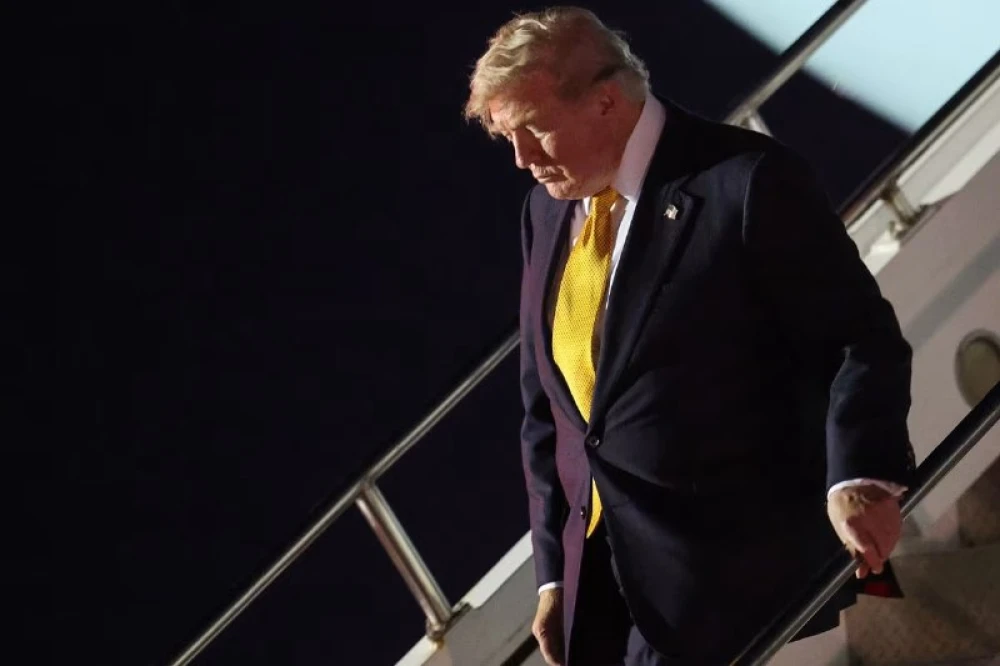Trump cites security protocol for switching planes on return flight
